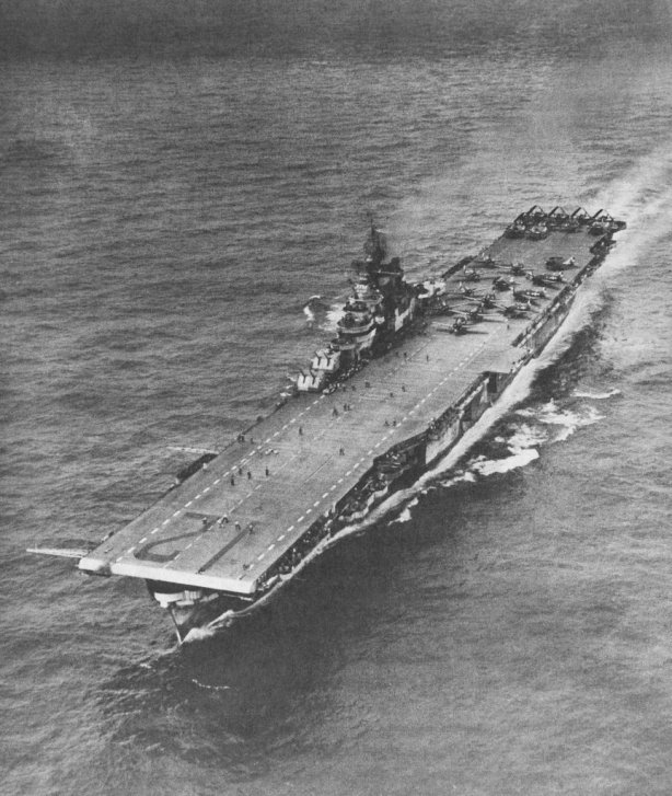Another aerial view of USS Hornet (CV-12) underway, that might have been taken at the same time as the photos above